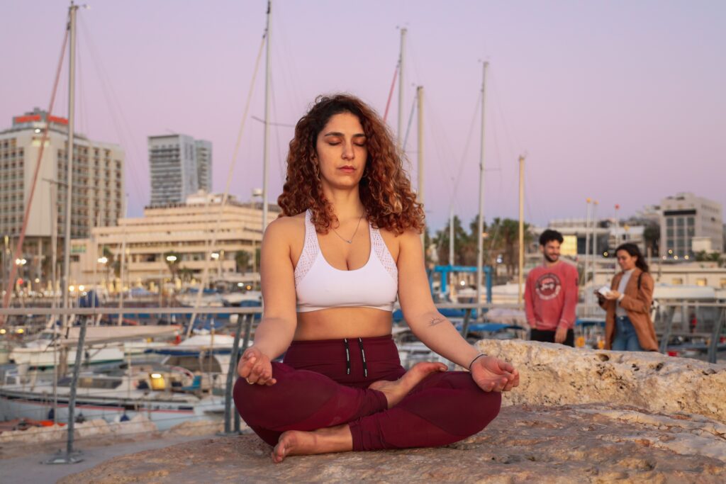 Woman doing yoga outdoors