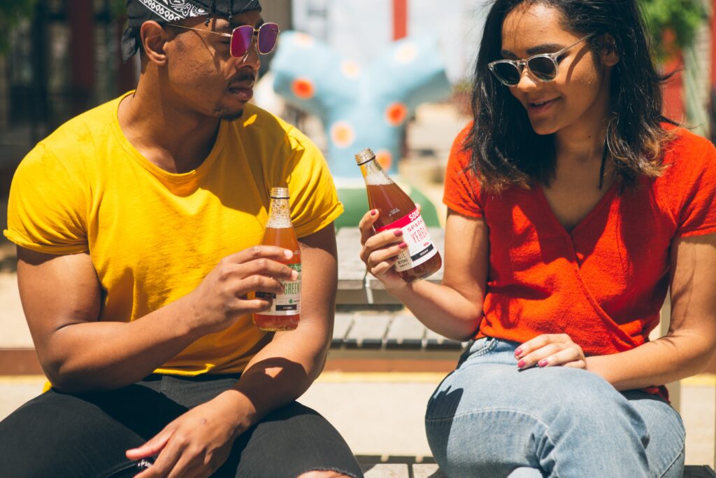 Guy and lady having a drink