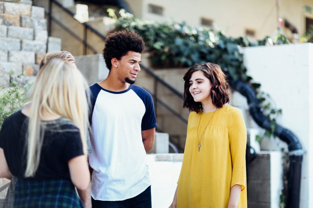 Three people discussing