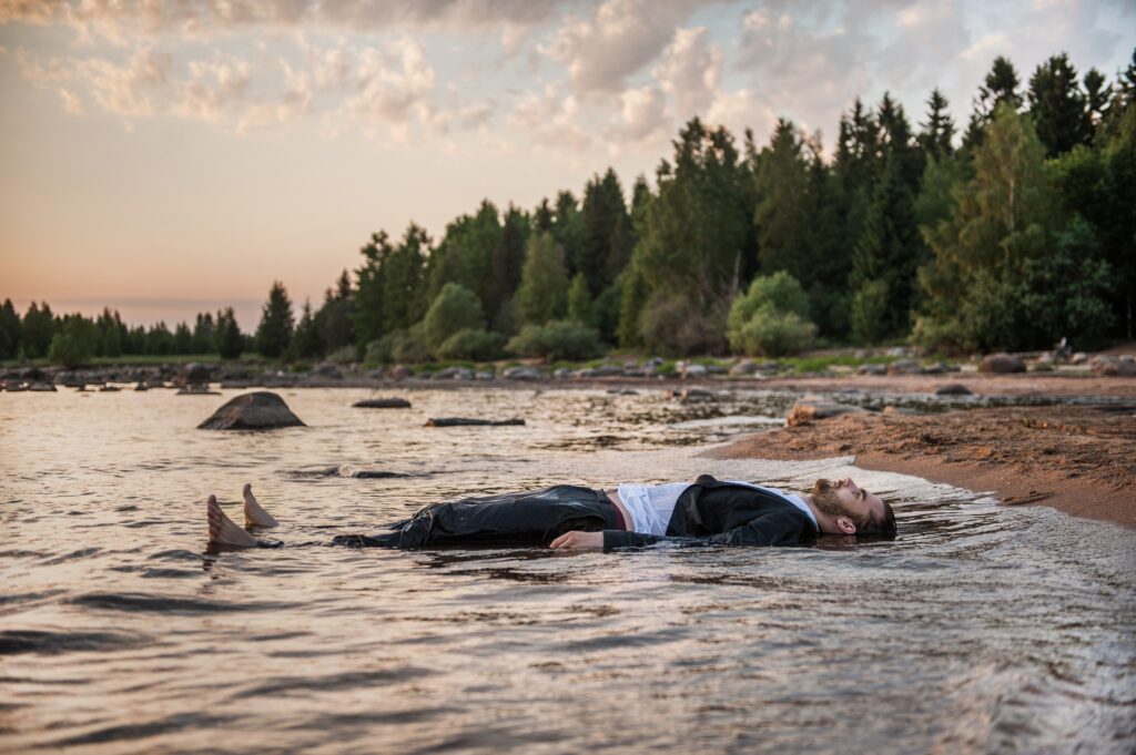 Lying on water